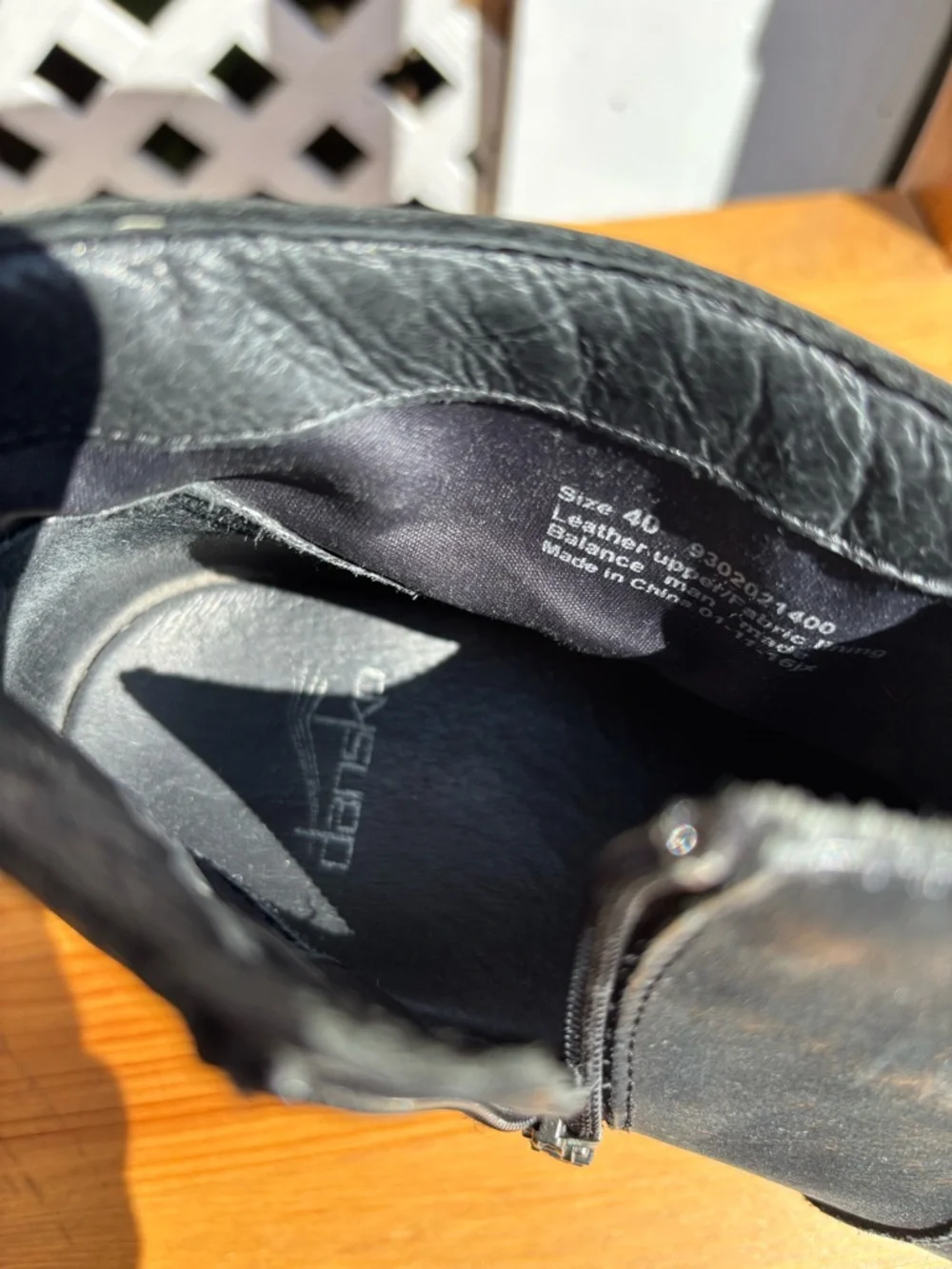 Dansko Black Leather Ankle Booties with Natural Wood-Look Heel
